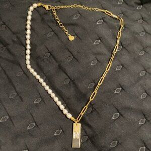 Elegant Gold and Silver Necklace “N”